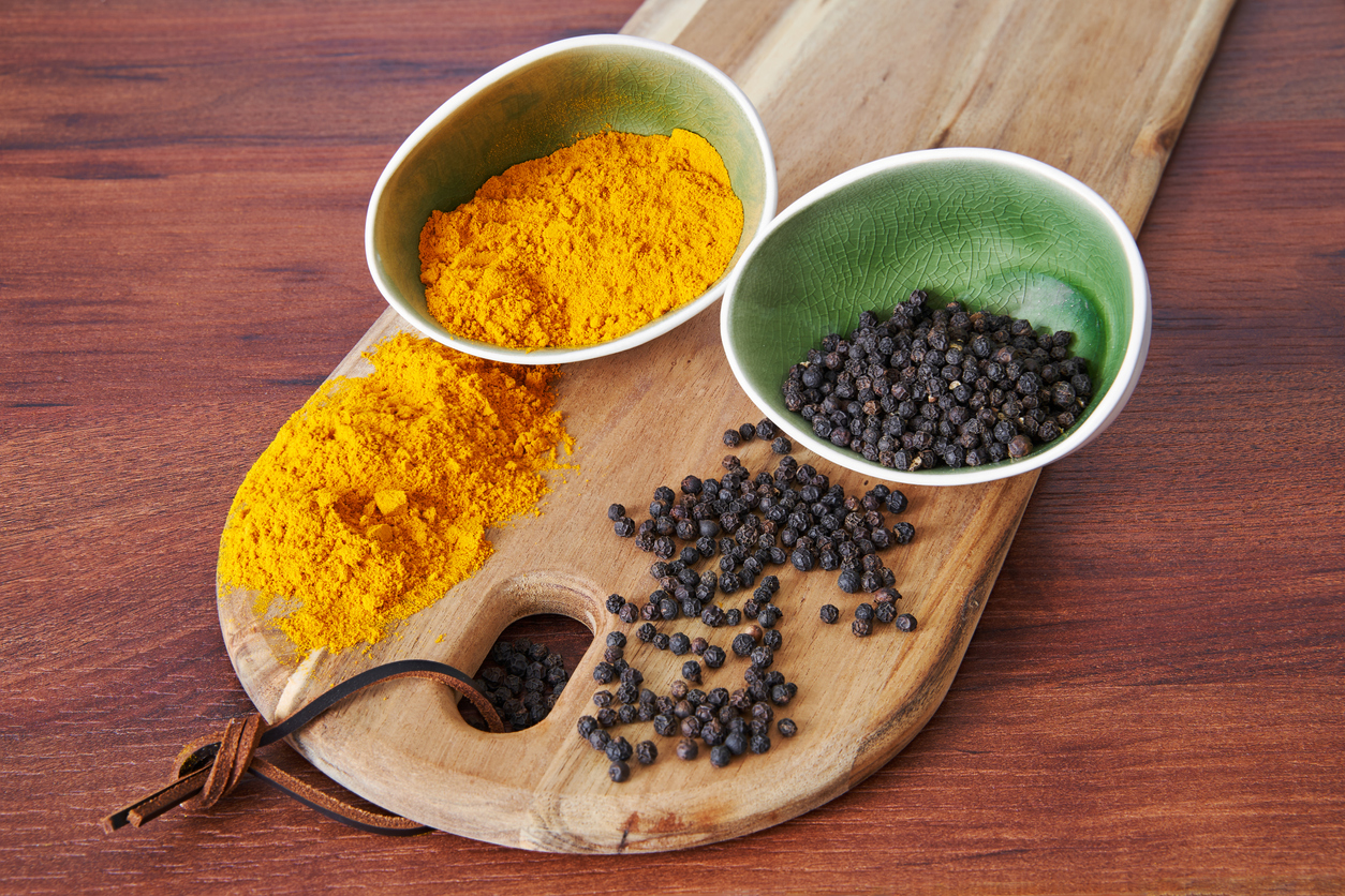 Turmeric and Pepper in bowls.